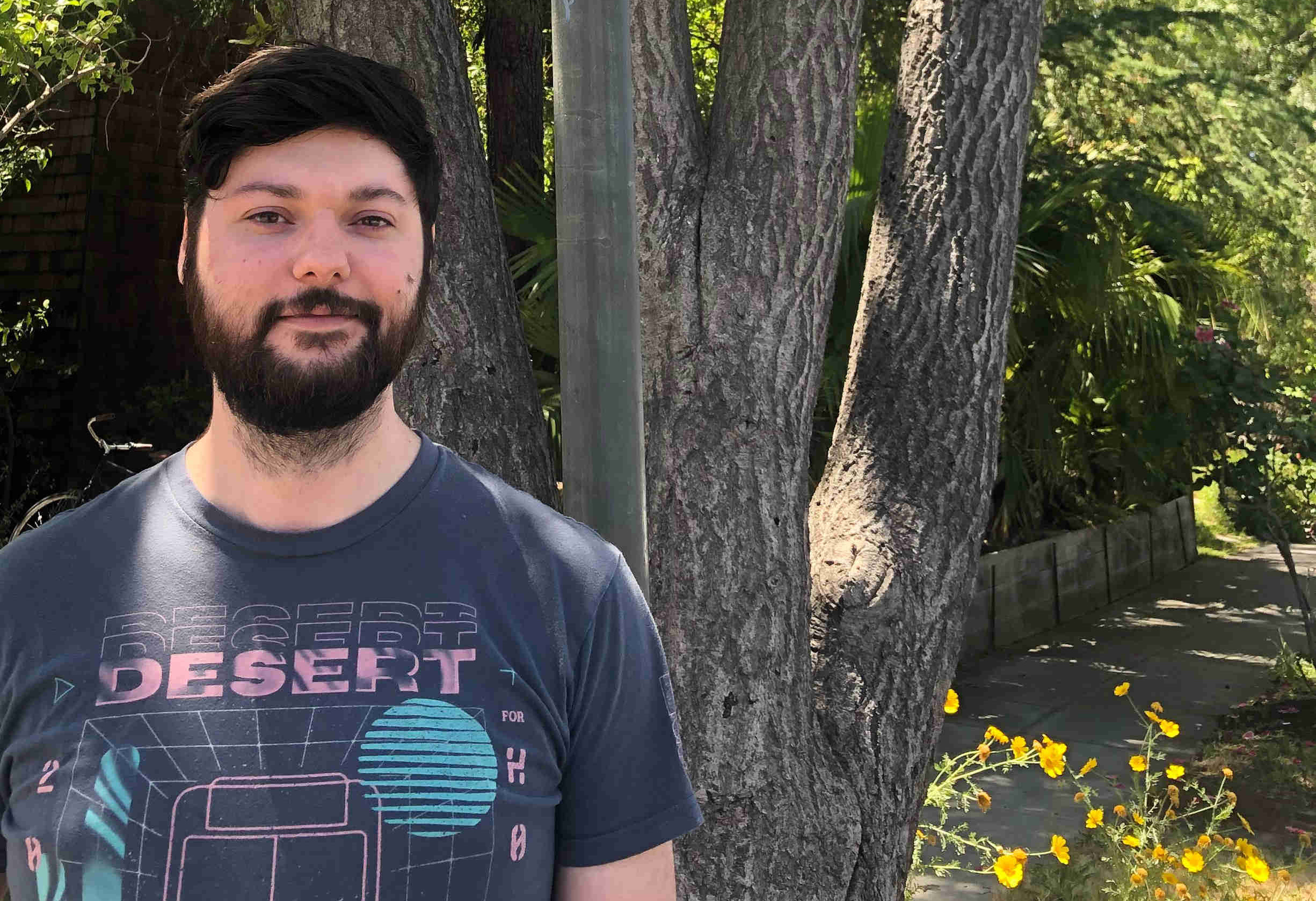 A mathematician standing at the intersection of streets named 'Oberlin' and 'College'